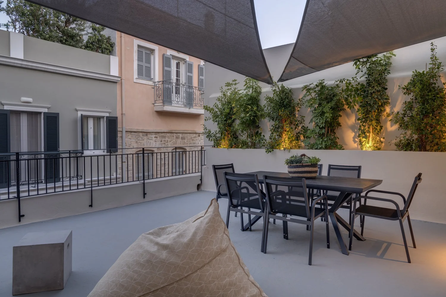 Outdoor dining on the sheltered lower terrace