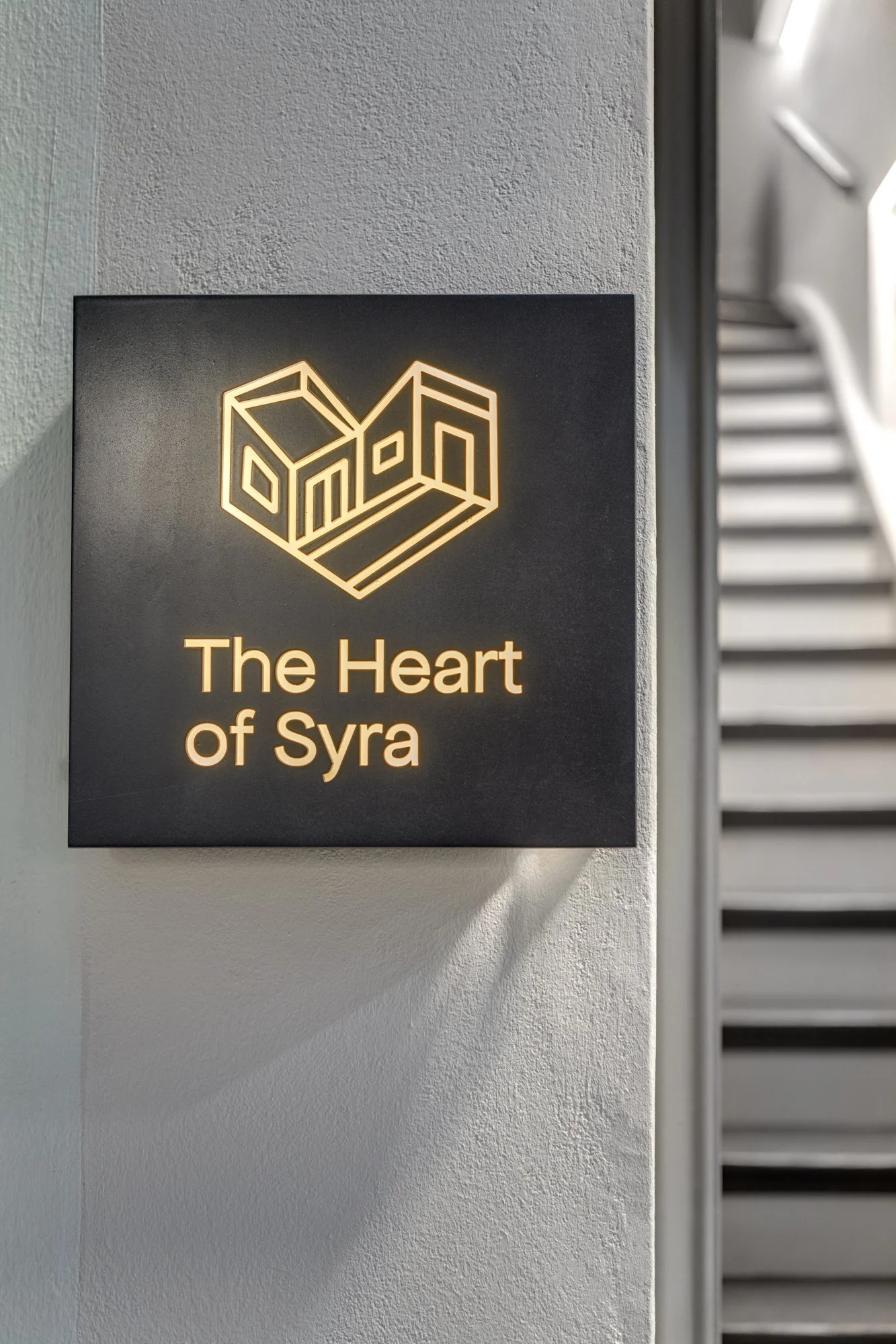 The Heart of Syra sign at the entrance